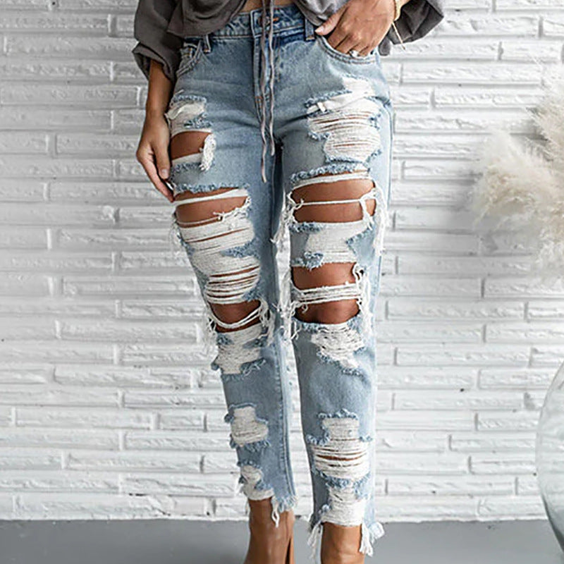 Fashion Hole Frayed Tassel Jeans Wholesale Womens Clothing
