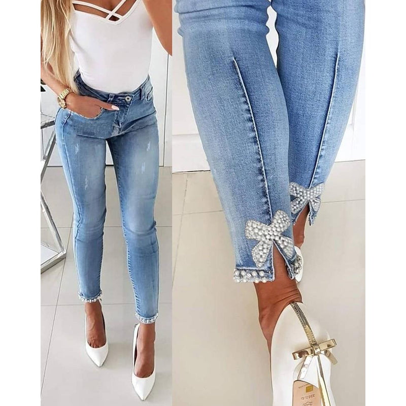 Temperament Slim Butterfly Beaded Foot Opening Jeans Wholesale Womens Clothing