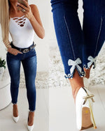 Temperament Slim Butterfly Beaded Foot Opening Jeans Wholesale Womens Clothing